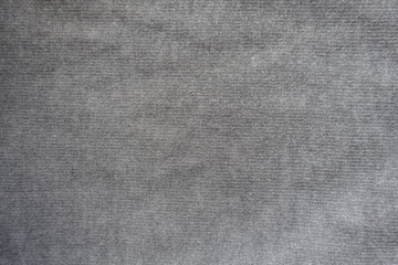 Fototapeta na wymiar Simple light grey jersey fabric from above