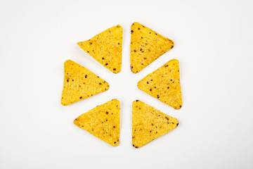 Corn chips nachos on a white background