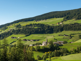 Santa Maddalena village in front of the Odle Dolomites Group, Italy, Europe. Autumn, 2017