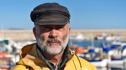 portrait of a fisherman in the harbor