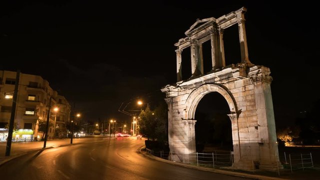 Night Athens. On right we see the Arch of Hadrian that leads to the pillars of Zeus's archaeological site.