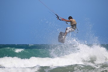 kitesurfer flies out of the water