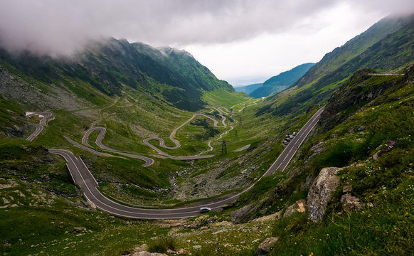 Transfagarasan road in Southern Carpathians on a stormy summer day. beautiful landscape with gloomy sky in Fagaras Mountains of Romania