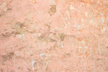 Light pink rough crack stucco background