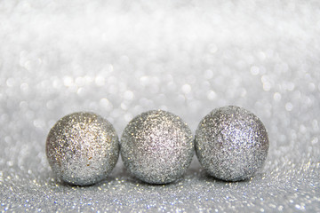three silver balls, a new year and Christmas silver decor, write your text