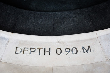 depth pool signage on step for notice