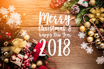 2018 Christmas and new year concept with arrange of decorating items on wooden top with free copy...
