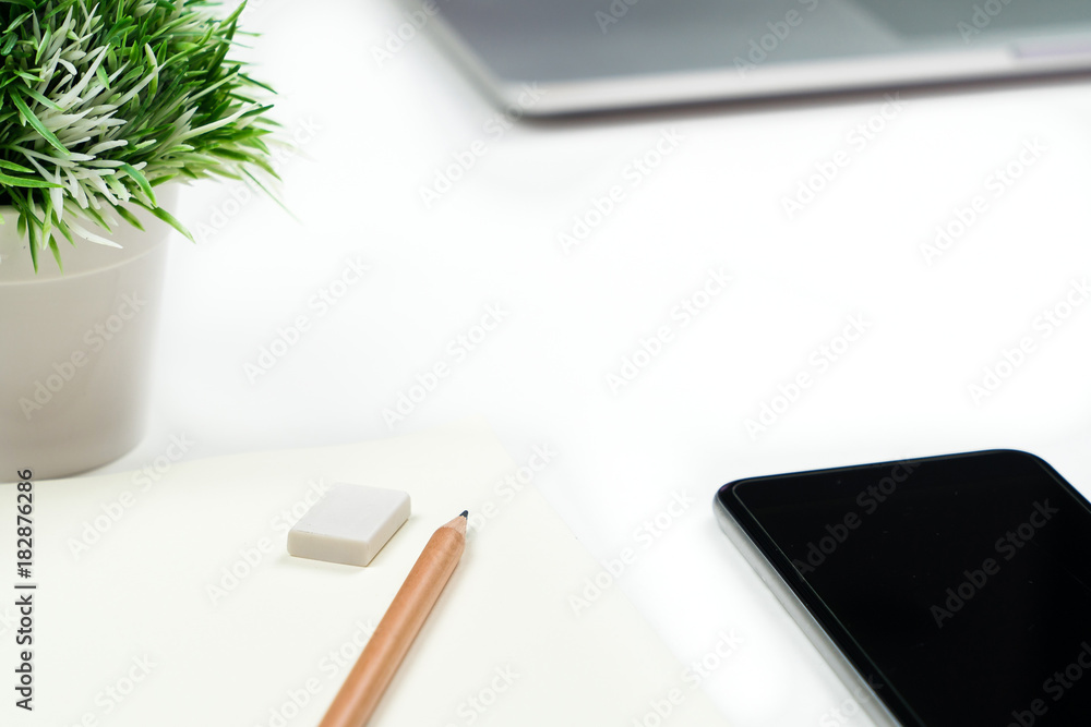 Poster Business office work desk table with computer laptop , note and stationery on white table background include copyspace for add text or graphic