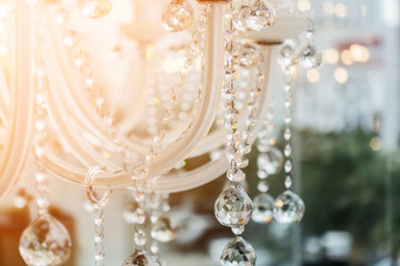 Chrystal chandelier close-up. Glamour background with copy space