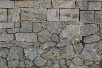 Texture. Masonry. Fragment of the ancient wall. Horizontal