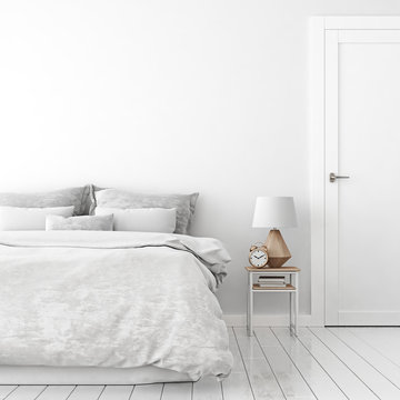 Home interior wall mock up with unmade bed, cushions, door, lamp and alarm clock in white bedroom. 3D rendering.