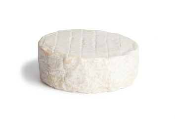 Brie type of cheese. Camembert cheese. Fresh Brie cheese. French cheese. Isolated on a white background.