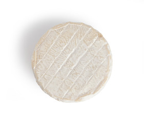 Brie type of cheese. Camembert cheese. Fresh Brie cheese. French cheese. Isolated on a white background.