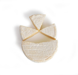 Brie type of cheese. Camembert cheese. Fresh Brie cheese and a slice. Italian, French cheese. Isolated on a white background.