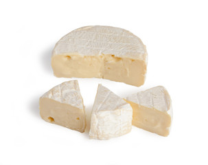 Fototapeta premium Brie cheesecakes, trisubbles, slices. Fresh cheese, Camemberttes. Isolated on white background.