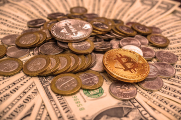 scattered coins on the background of dollars 