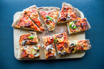 Slices of Pizza on cutting board