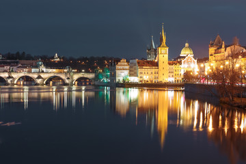 Fototapeta na wymiar Picturesque night view of the Vltava River, Charles Bridge and Old Town in Prague, Czech Republic