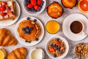 Delicious breakfast on a light table.