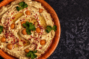 Classic hummus  on the plate.