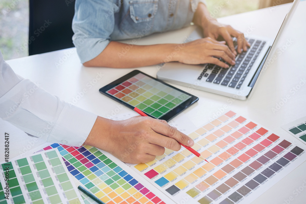 Poster young colleagues designers working together on a creative project and color samples for selection, c