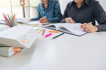 Images of Disappointed, Young students campus or classmates helps friend catching up workbook and learning tutoring in classroom, teaching, learning, People, technology, Education school concept