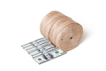 Roll twine stands on dollar banknotes