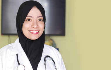 beautiful muslim doctor algerian woman with a beautiful smile and looking to camera