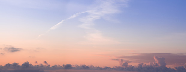 Colorful dawn/dusk sky panorama with clouds background.