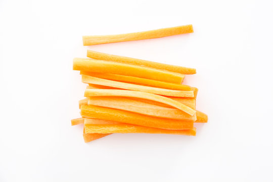 Sliced carrots on white background.