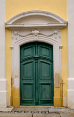 Fototapeta na wymiar Wooden doors on church in Eisenstadt, Burgenland, Austria