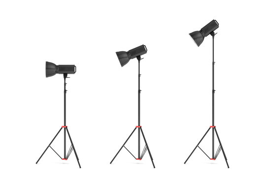 3d rendering of three lights with reflectors with the head turned down and up.