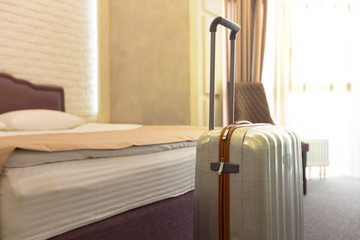 Suitcase or luggage bag in a modern hotel room