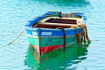 Colorful fishing boat in a sea water. Island Sal, Cape Verde