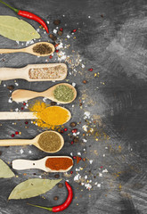 Various spices on a black background. Top view, copy space. Food background