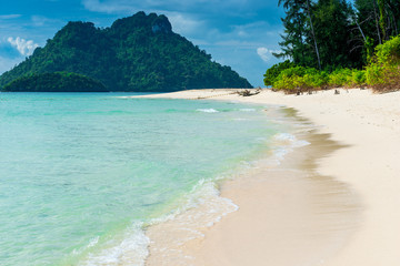 tropical empty beach with white sand and turquoise water, Poda island, Thailand