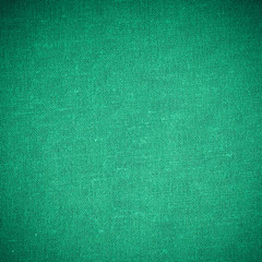 Closeup of green fabric textile material as texture or background