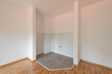 Fototapeta premium Space with tilles for kitchen in empty apartment