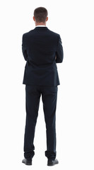 rear view.confident businessman with briefcase