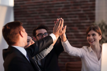 successful business team giving each other a high five