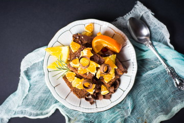 Chocolate cake with orange on a plate