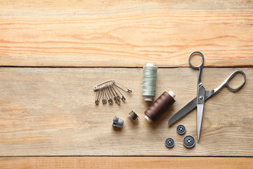 Accessories for tailoring on wooden table