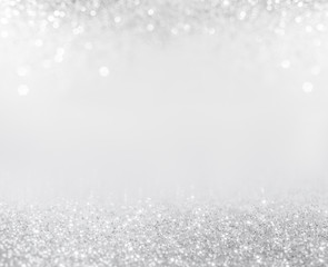 Abstract of Bright and sparkling bokeh background. silver and diamond dust bokeh blurred lighting from glitter texture - obrazy, fototapety, plakaty