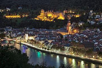 Heidelberg, Germany. Evening view of Old Town with Heidelberg Castle, Church of the Holy Spirit and...