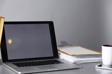 Workspace with computer and documents in office