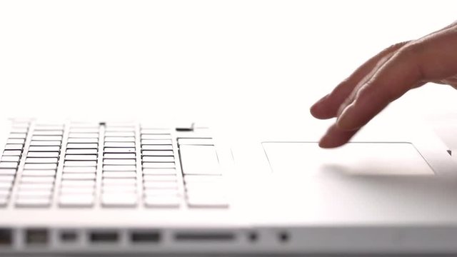 Man using touchpad on a laptop