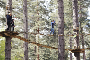 mother and sons on high ropes