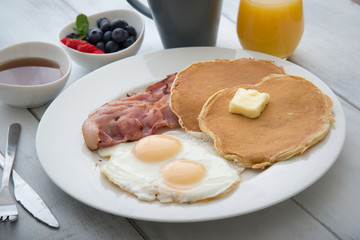 pancake with bacon and fried egg