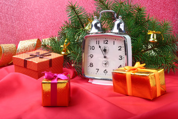 Christmas vintage clock. New Year's Decoration with gift boxes, christmas balls and tree. Celebration Concept for New Year.