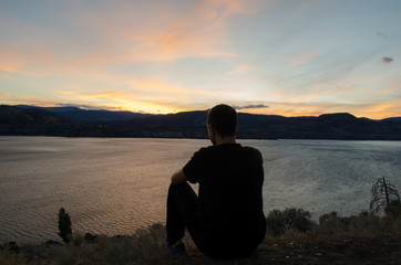 Man enjyoing the sunset in Penticton